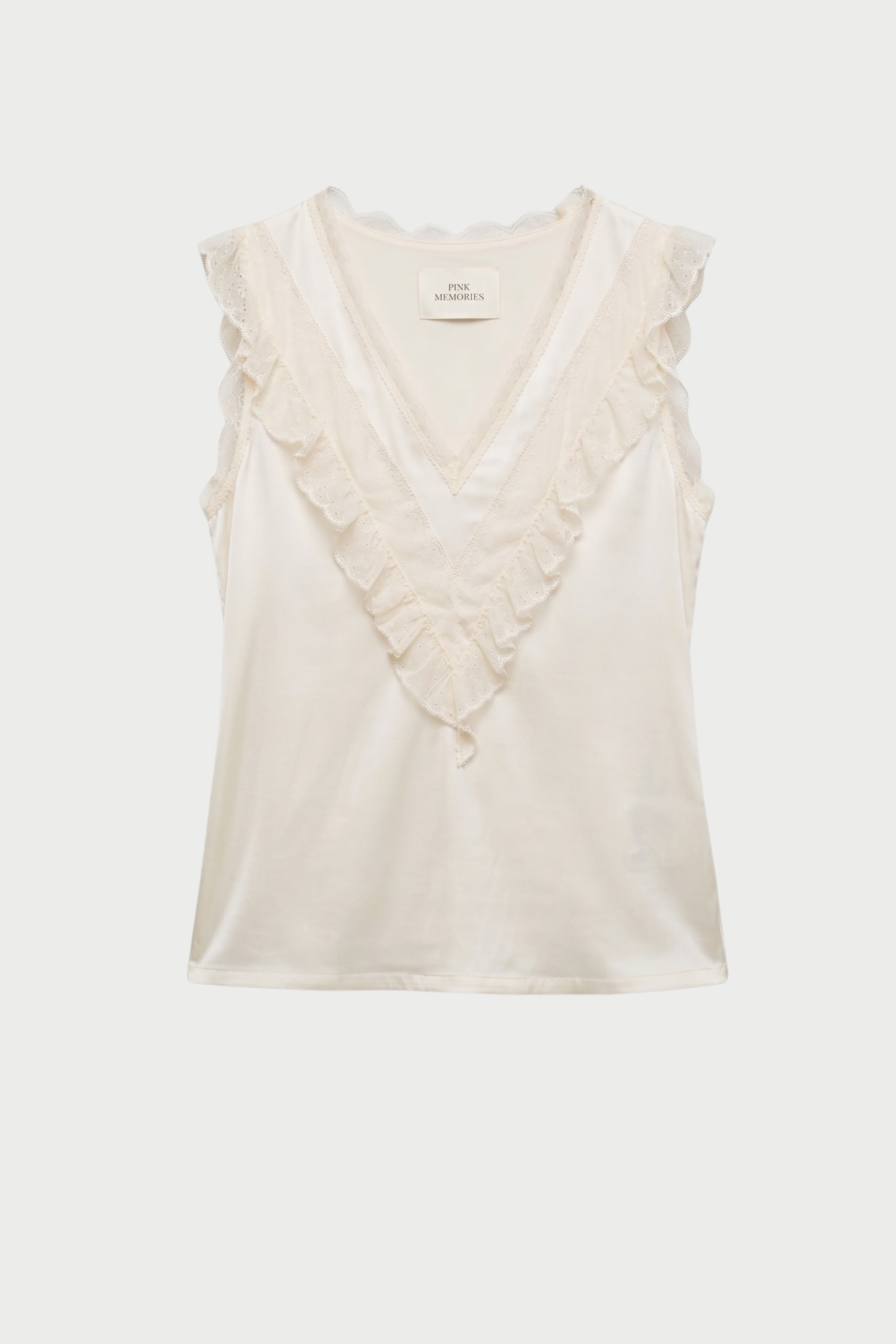 TOP SPALLA LARGA CON PIZZO