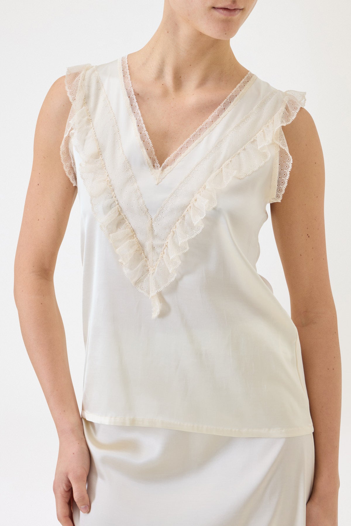 TOP SPALLA LARGA CON PIZZO