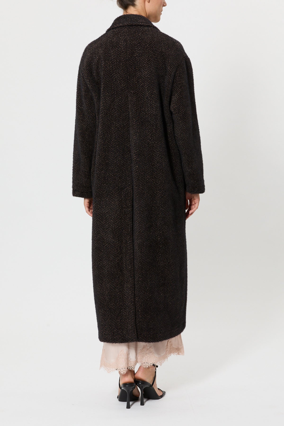 FUR COAT WITH JEWEL BROOCH