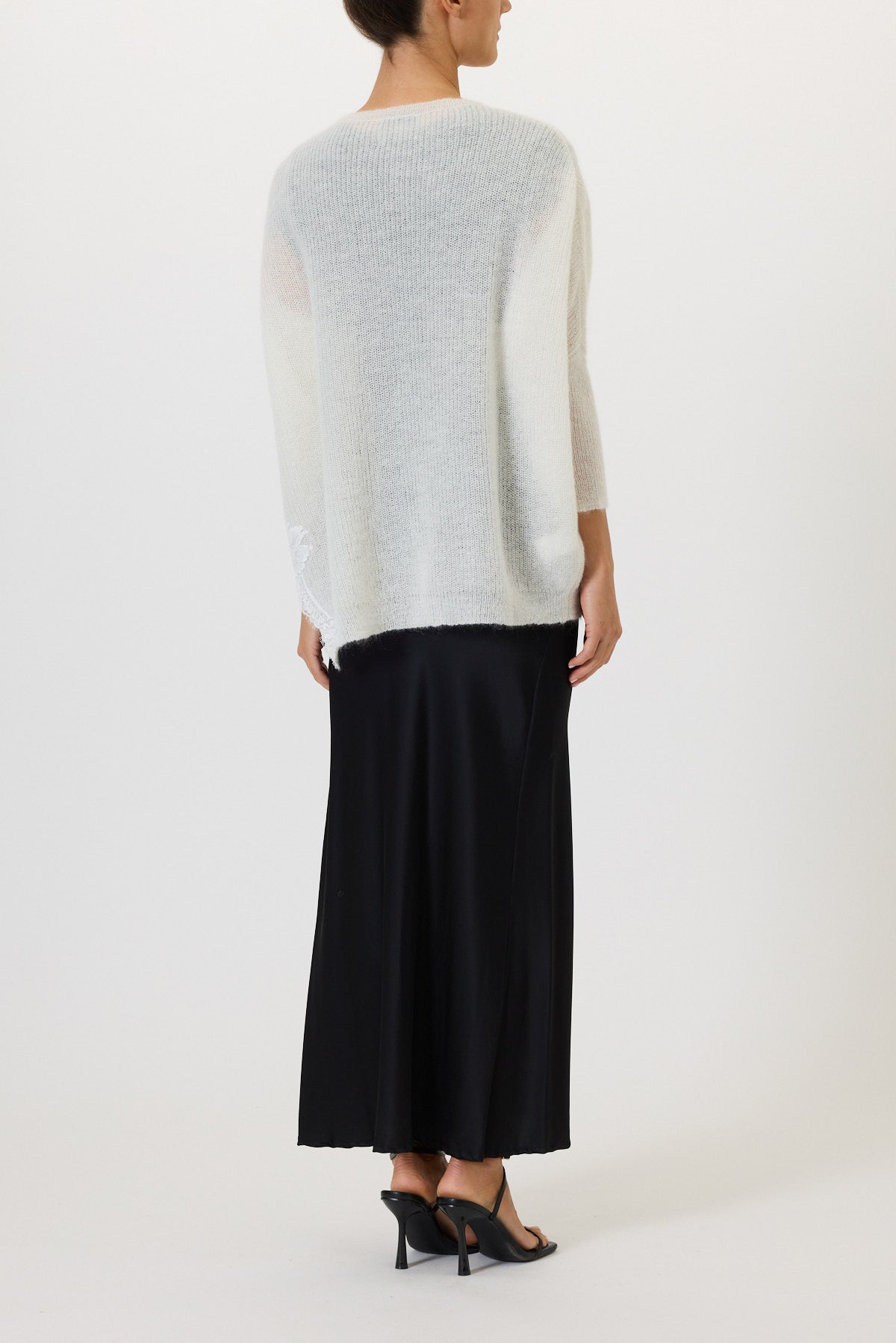 MAGLIA CON SPACCHI E PIZZO