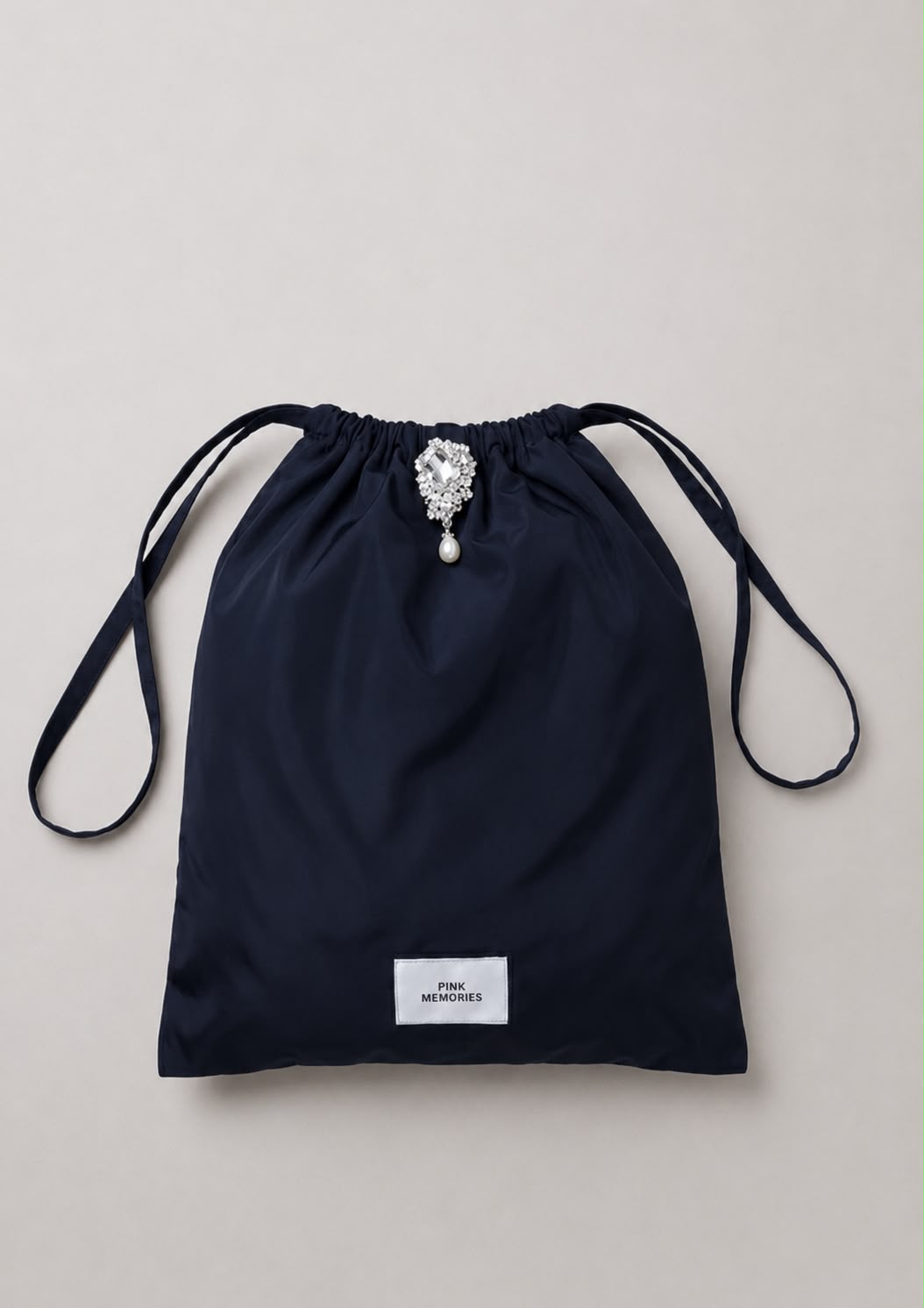 BAG WITH JEWEL BROOCH