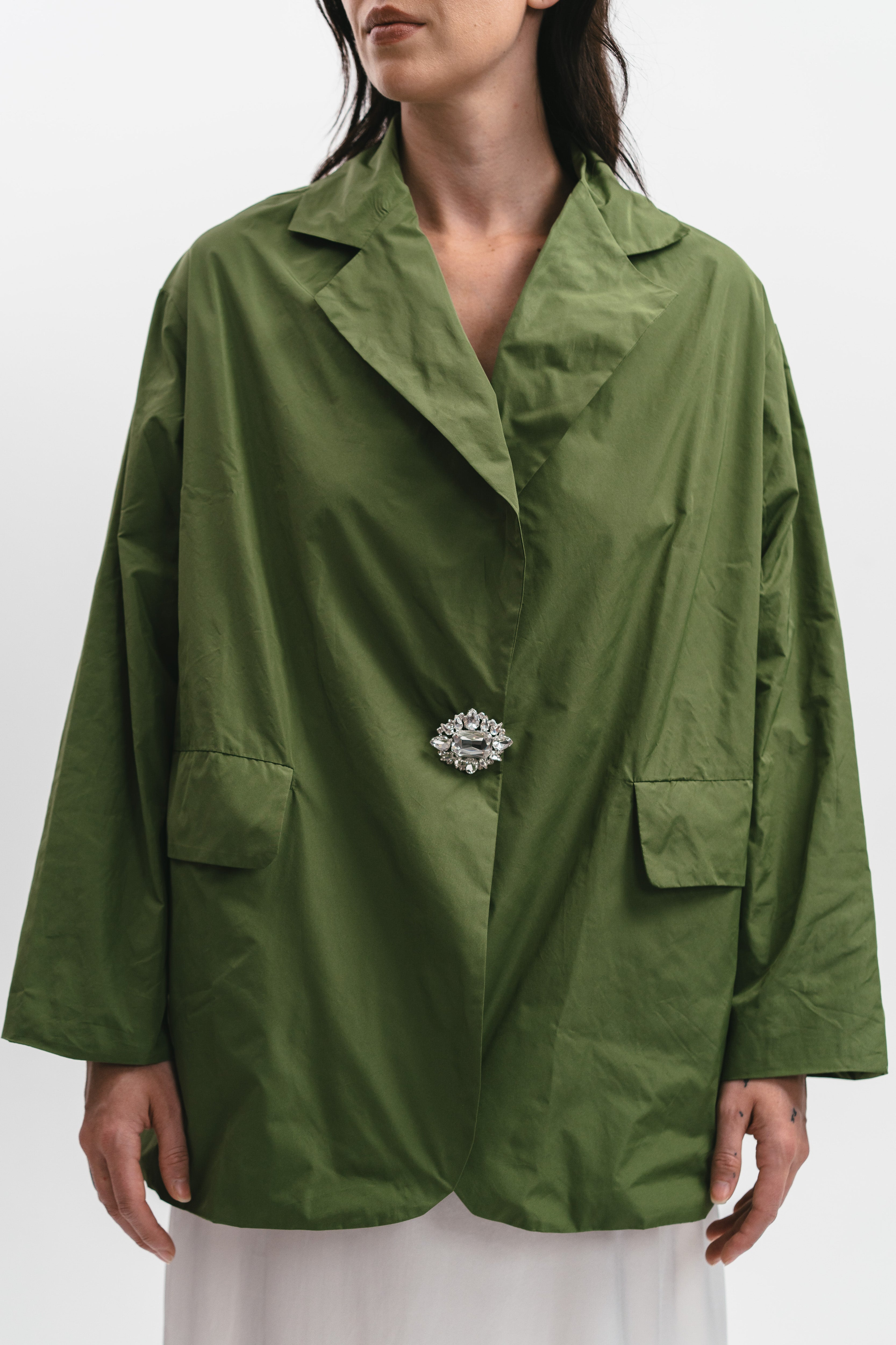 WINDPROOF TAFFETA JACKET WITH BELT AND JEWEL BROOCH