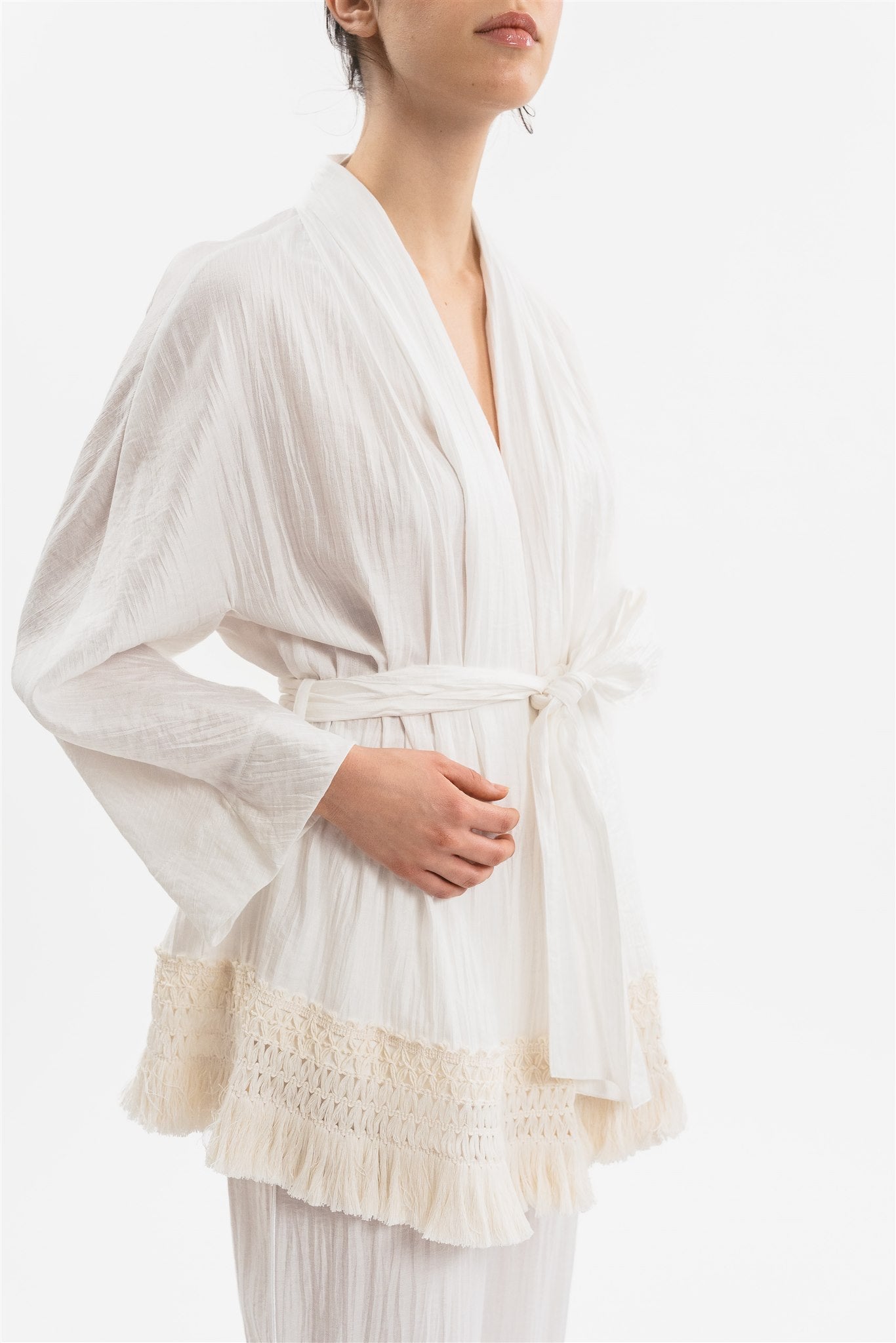 Giacca kimono con frange. Dettaglio