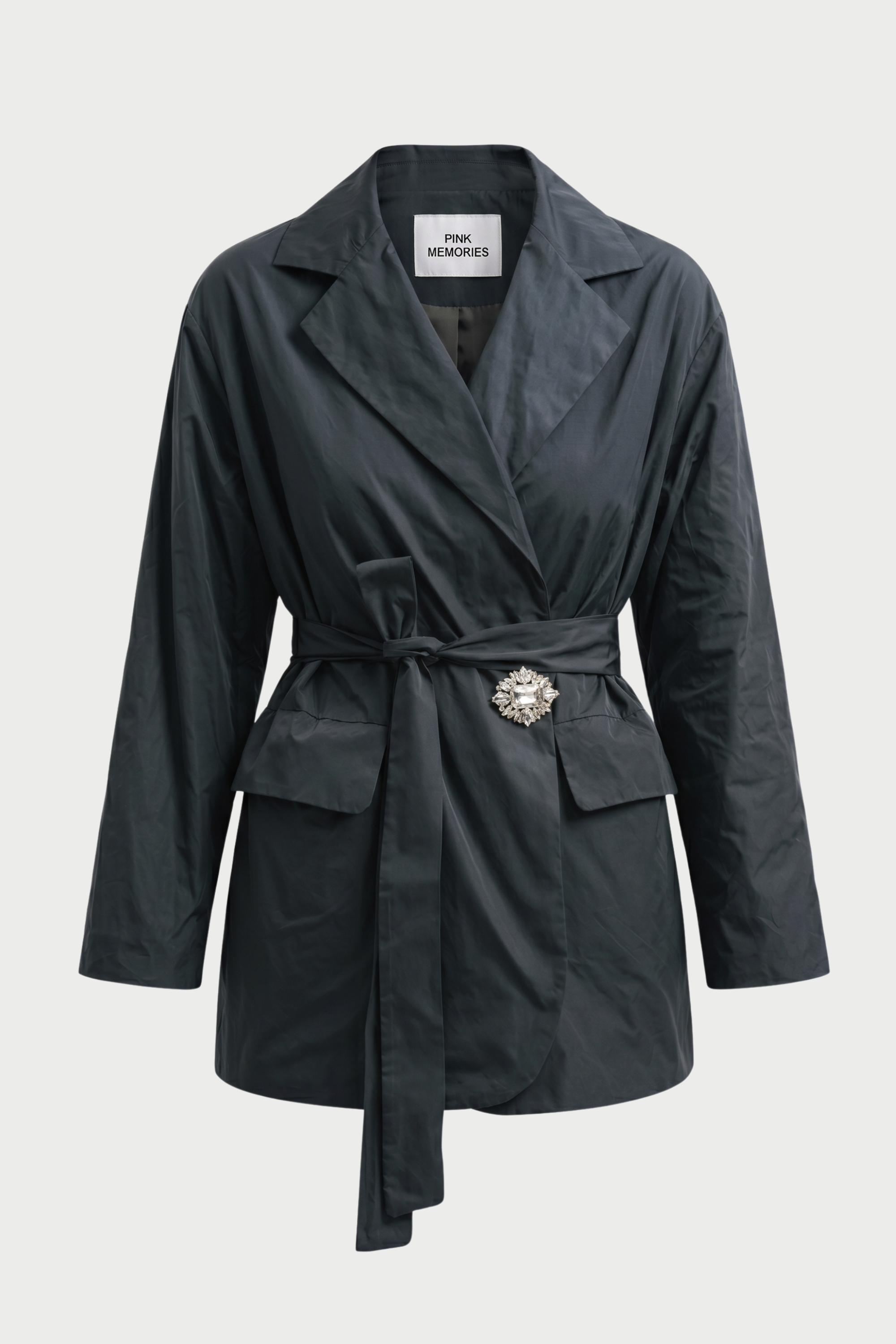 WINDPROOF TAFFETA JACKET WITH BELT AND JEWEL BROOCH
