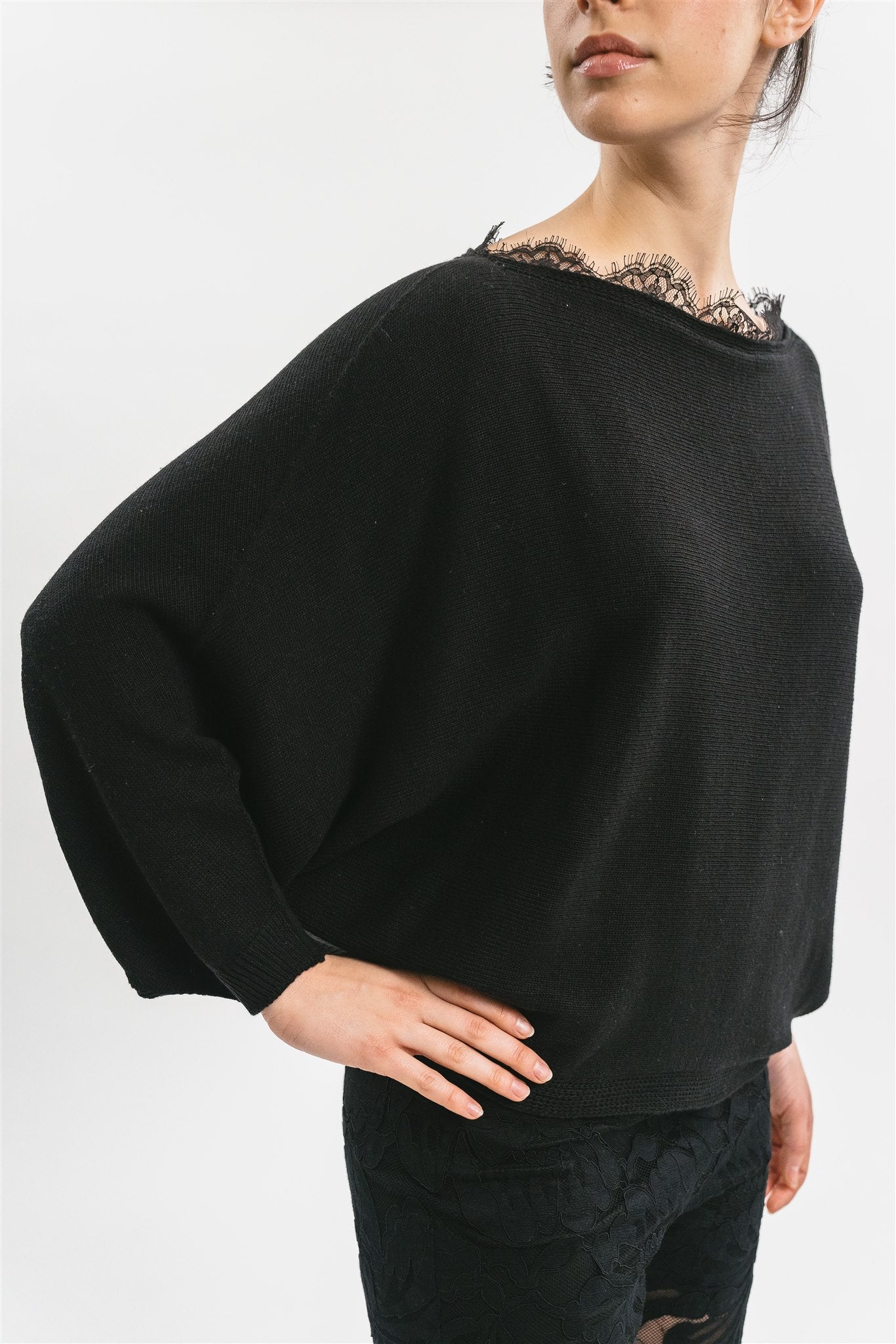 Maglia poncho dettaglio