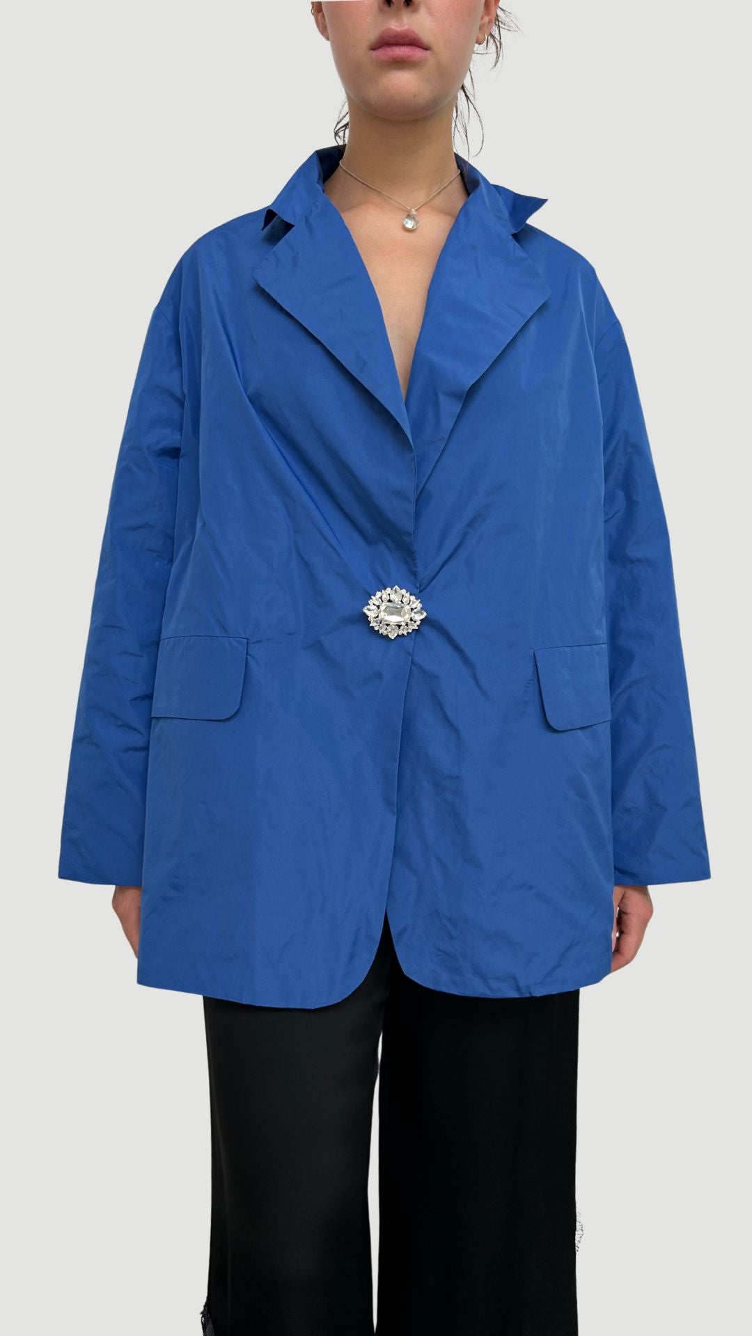 WINDPROOF TAFFETA JACKET WITH BELT AND JEWEL BROOCH