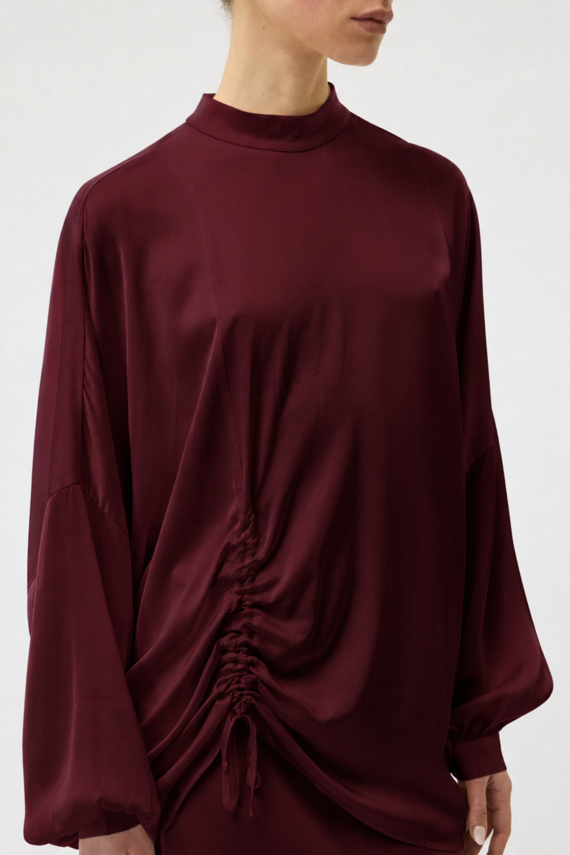 CAMICIA CON DRAPPEGGIO