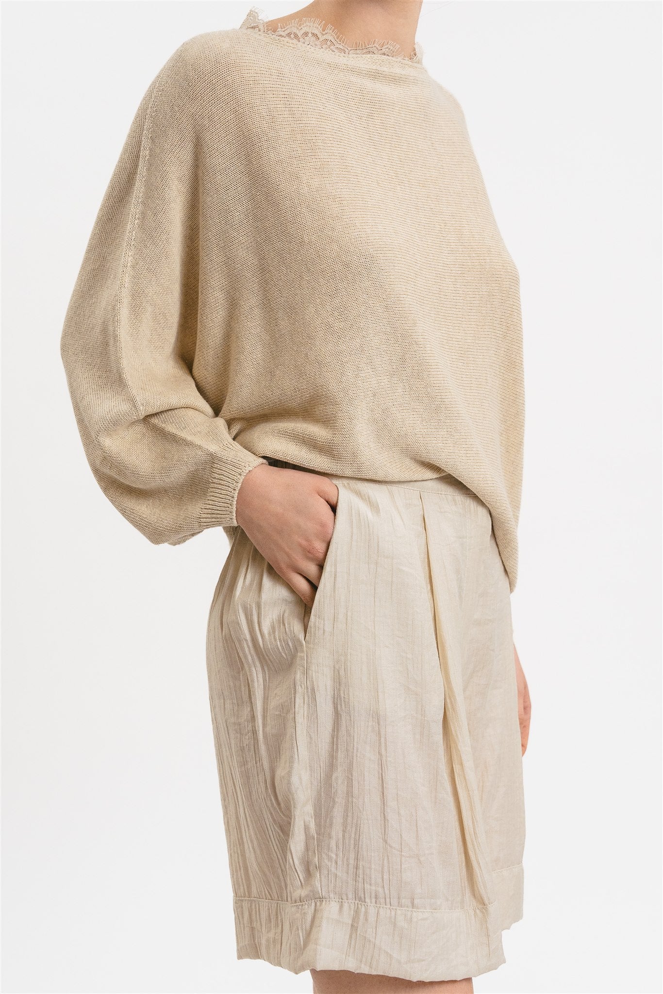 Maglia poncho dettaglio