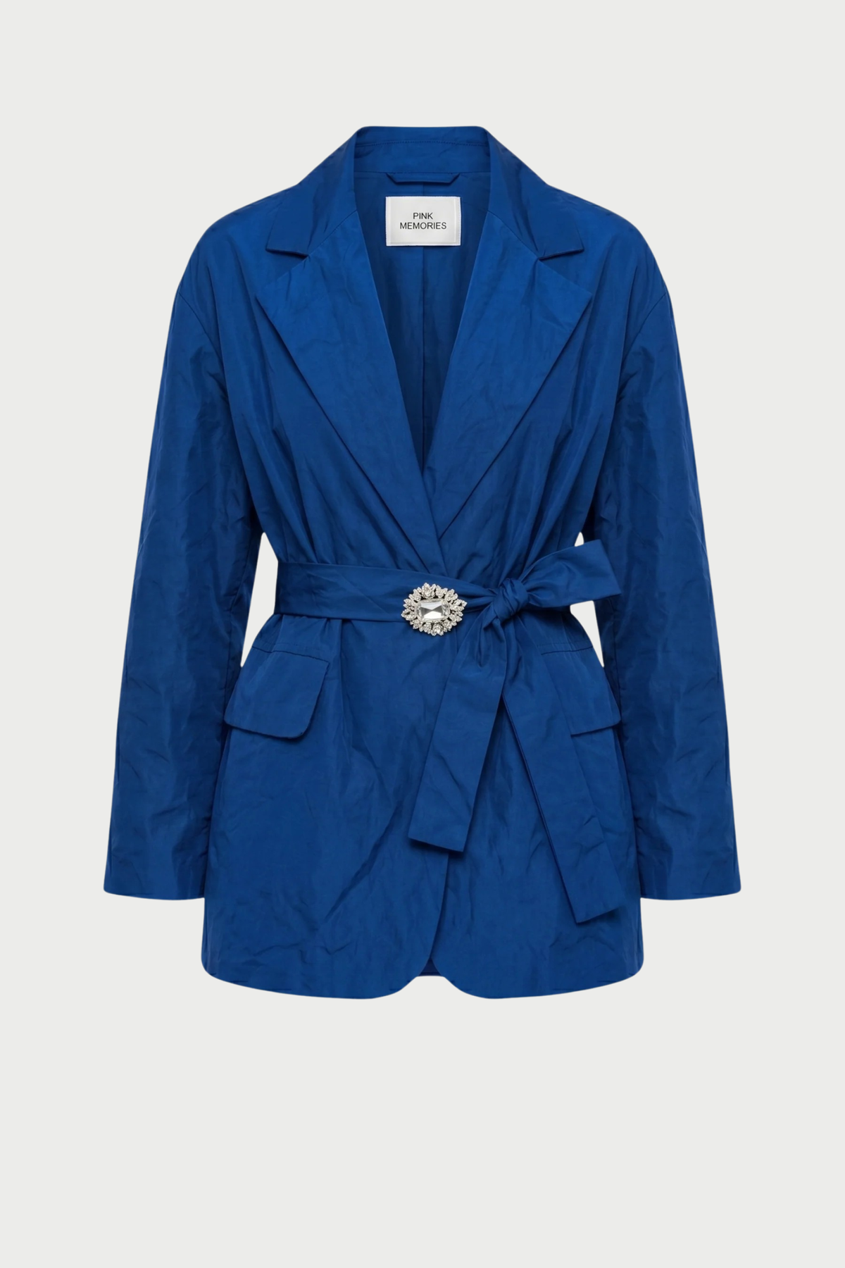WINDPROOF TAFFETA JACKET WITH BELT AND JEWEL BROOCH