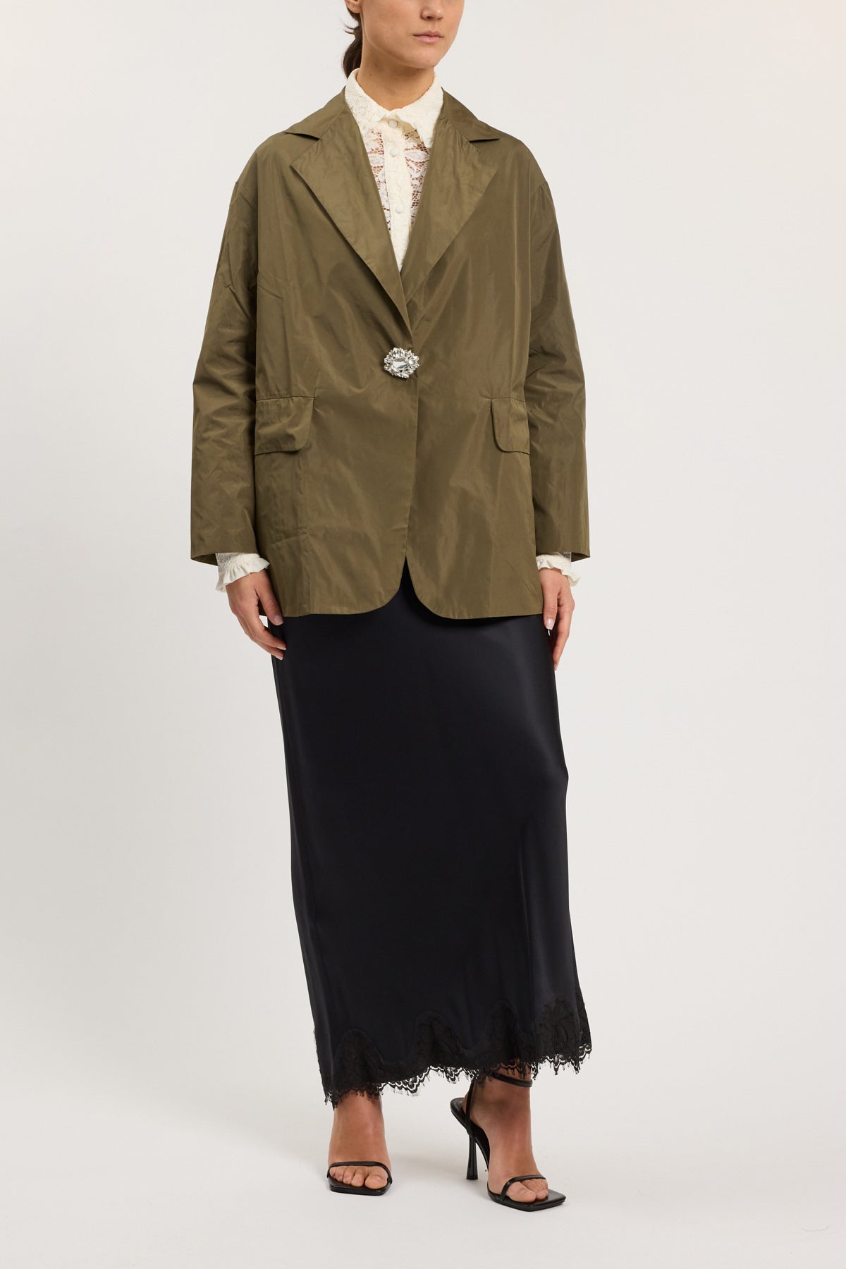 WINDPROOF TAFFETA JACKET WITH BELT AND JEWEL BROOCH