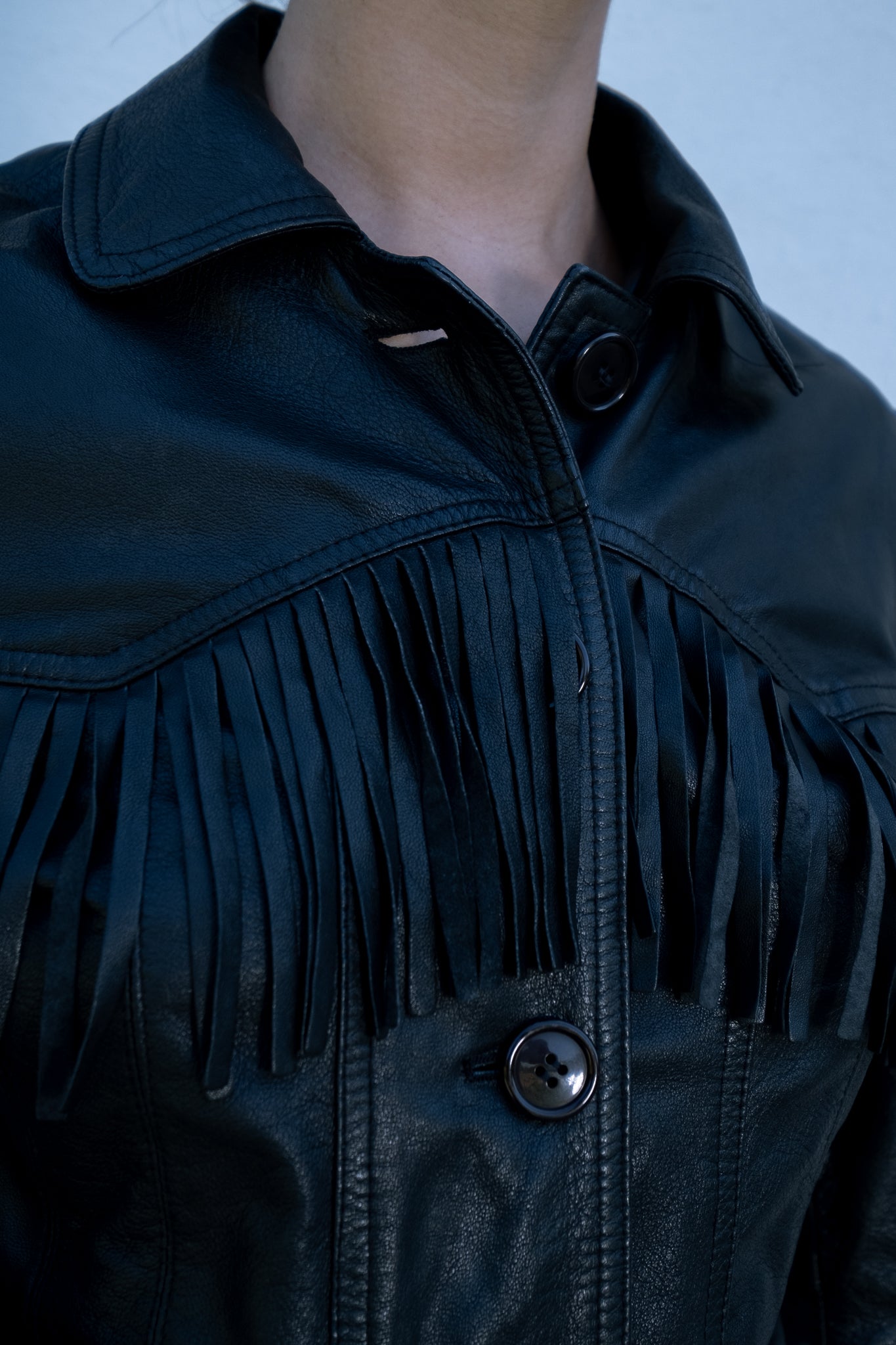 Leather jacket with fringes