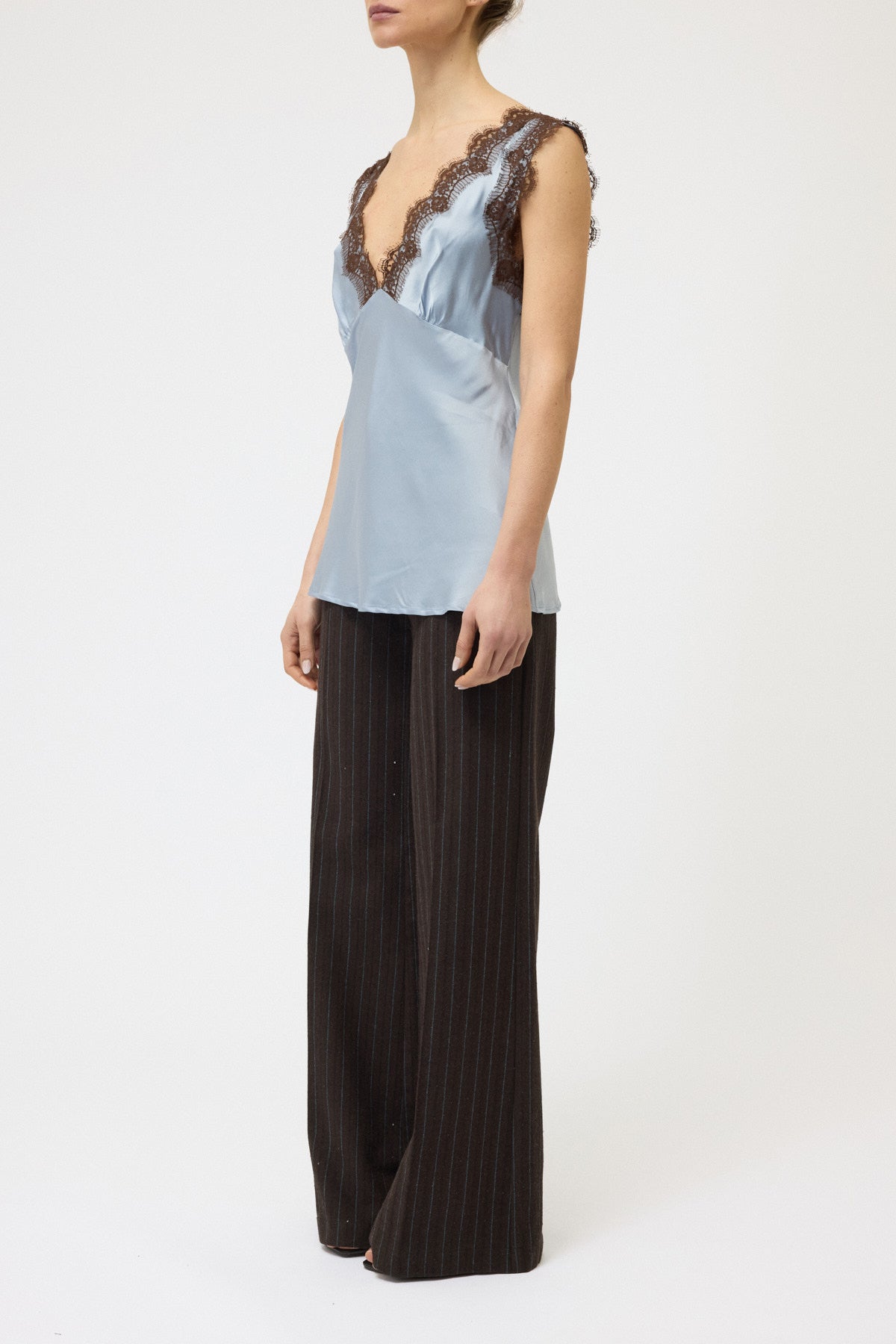 TOP SCOLLO A V CON PIZZO