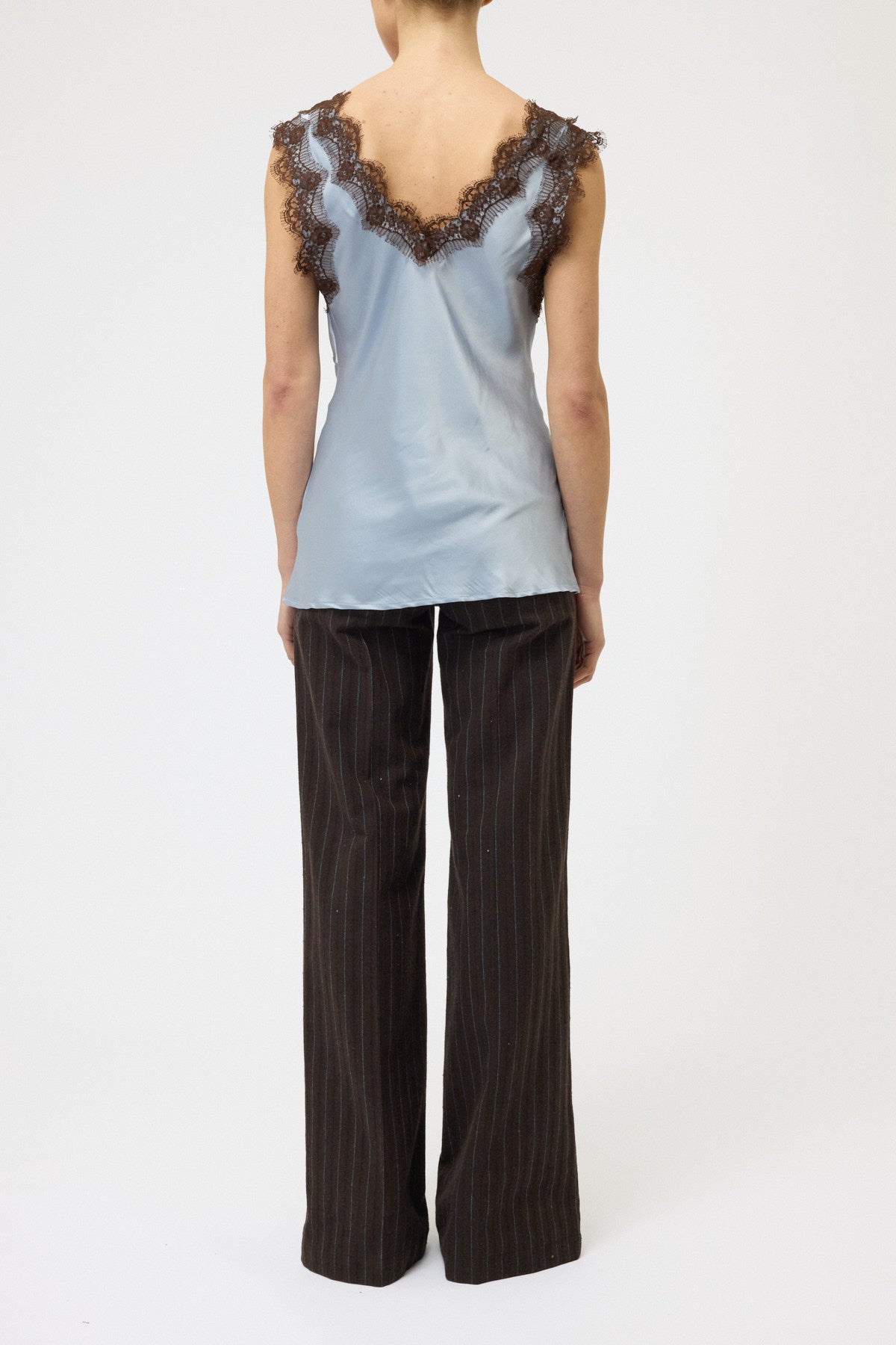 TOP SCOLLO A V CON PIZZO