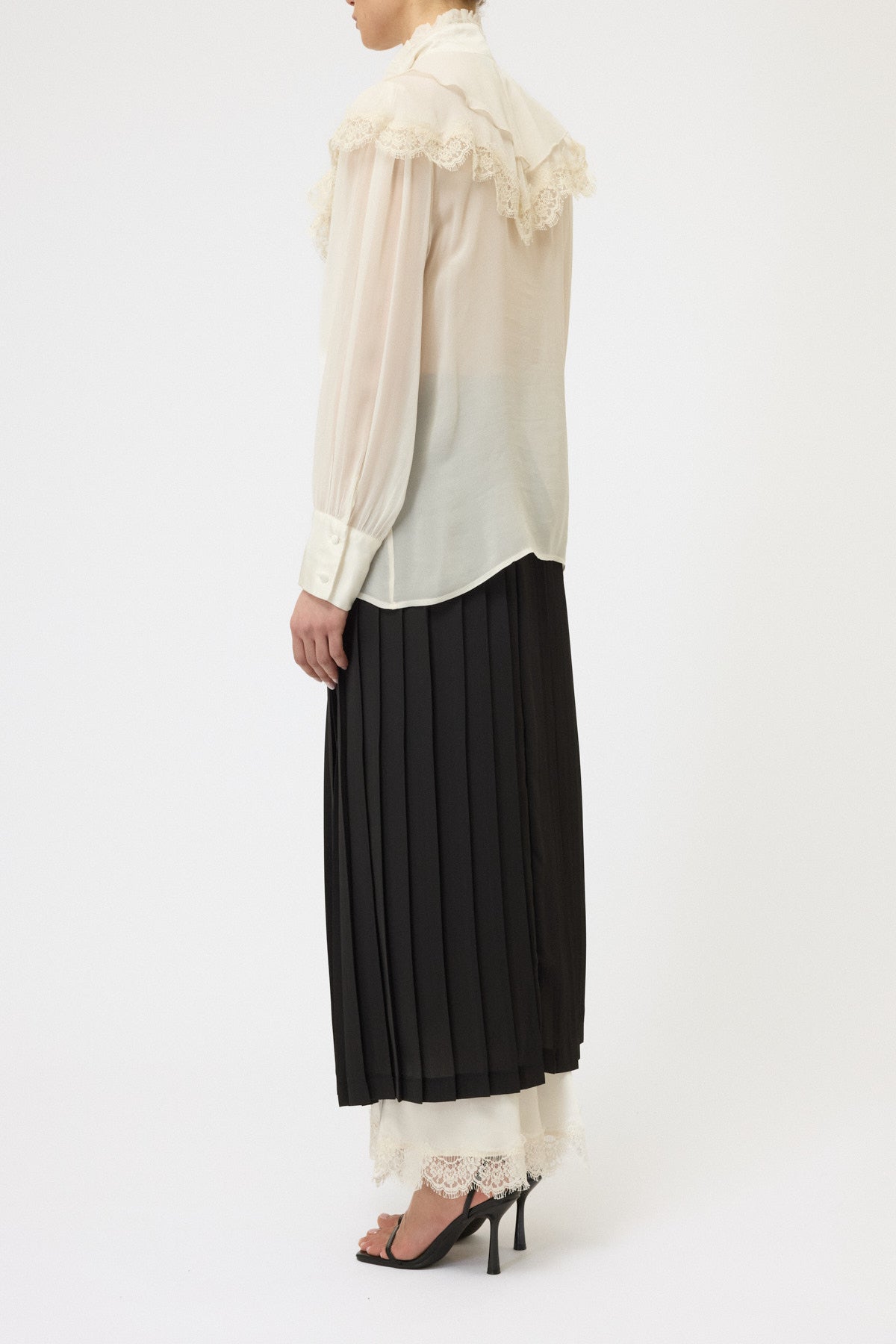 CAMICIA CON ROUCHES E PIZZO