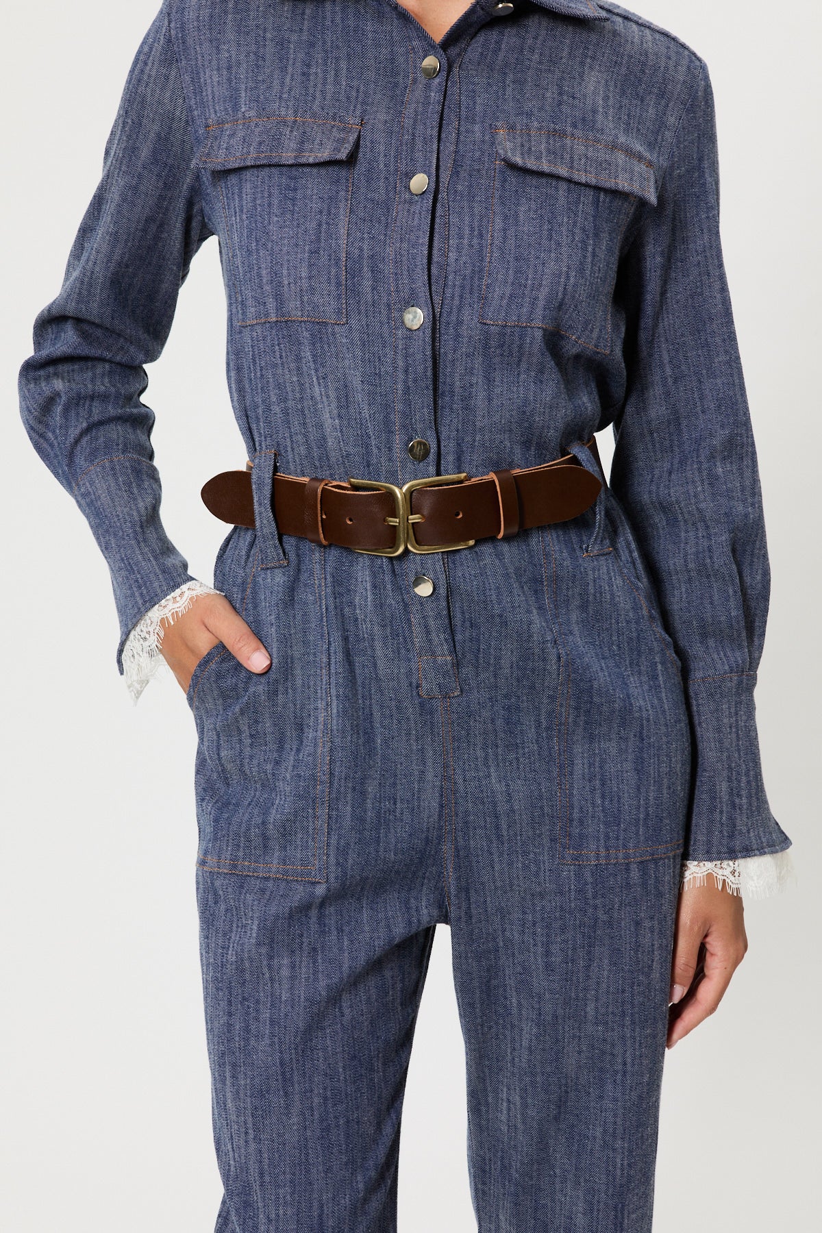 TUTA IN DENIM CON PIZZO