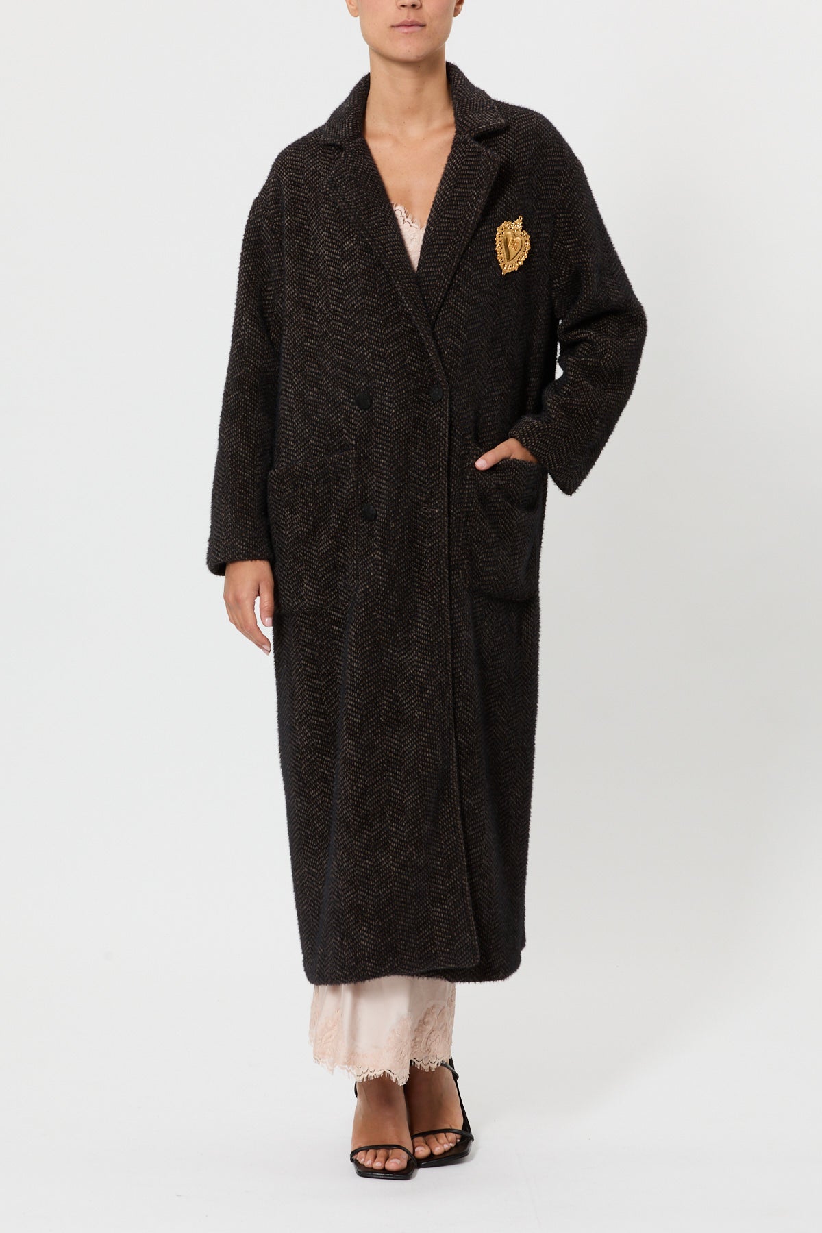 FUR COAT WITH JEWEL BROOCH