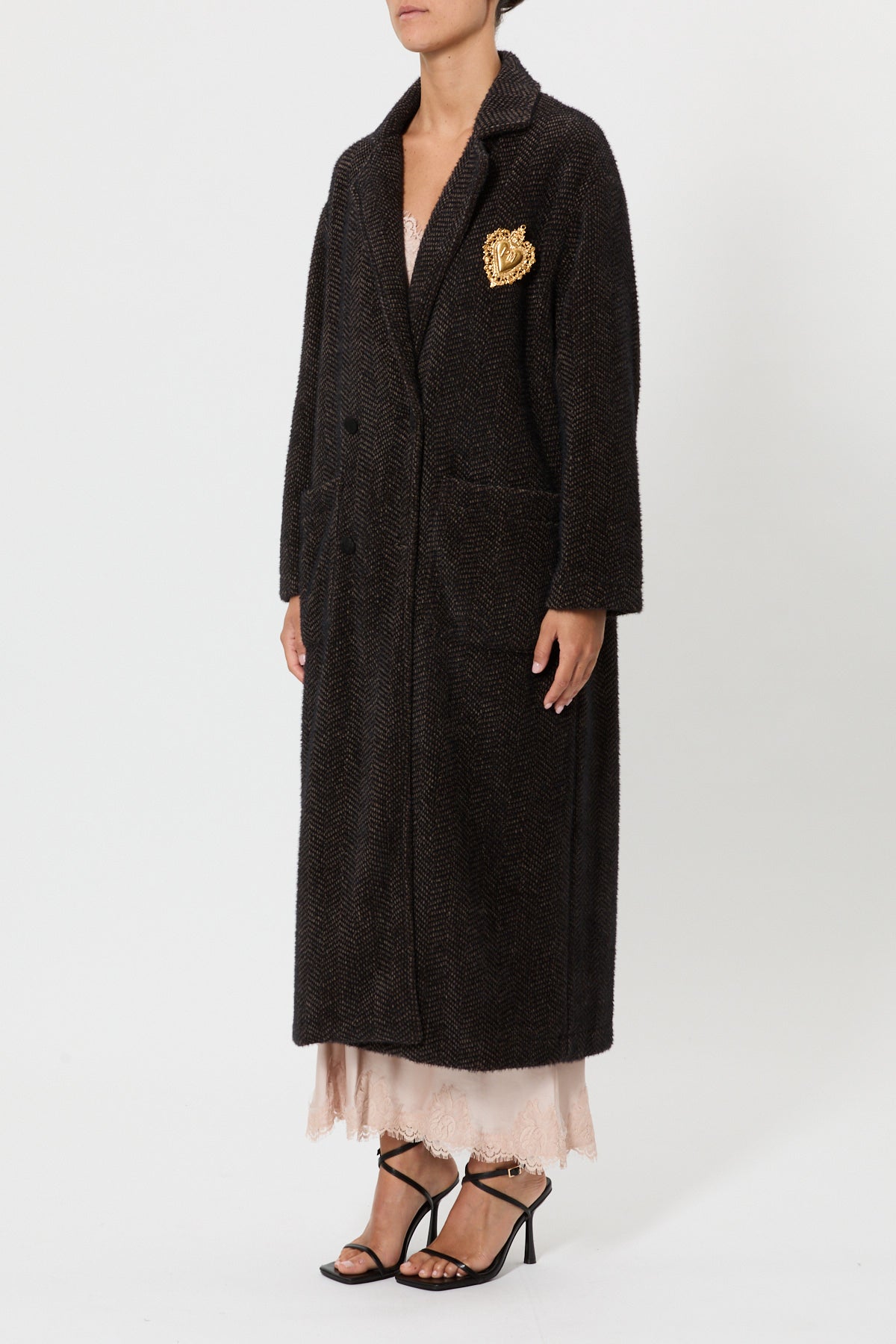 FUR COAT WITH JEWEL BROOCH