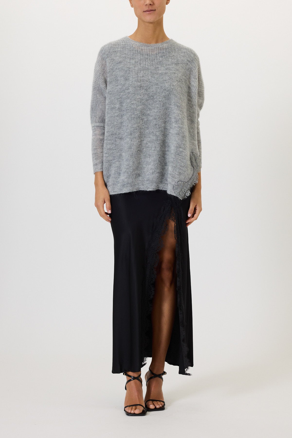 MAGLIA CON SPACCHI E PIZZO