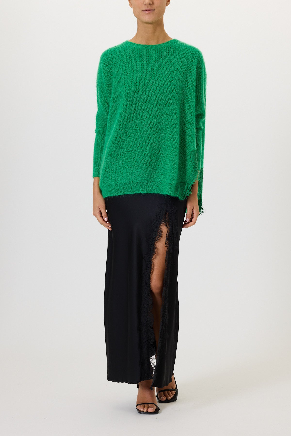 MAGLIA CON SPACCHI E PIZZO