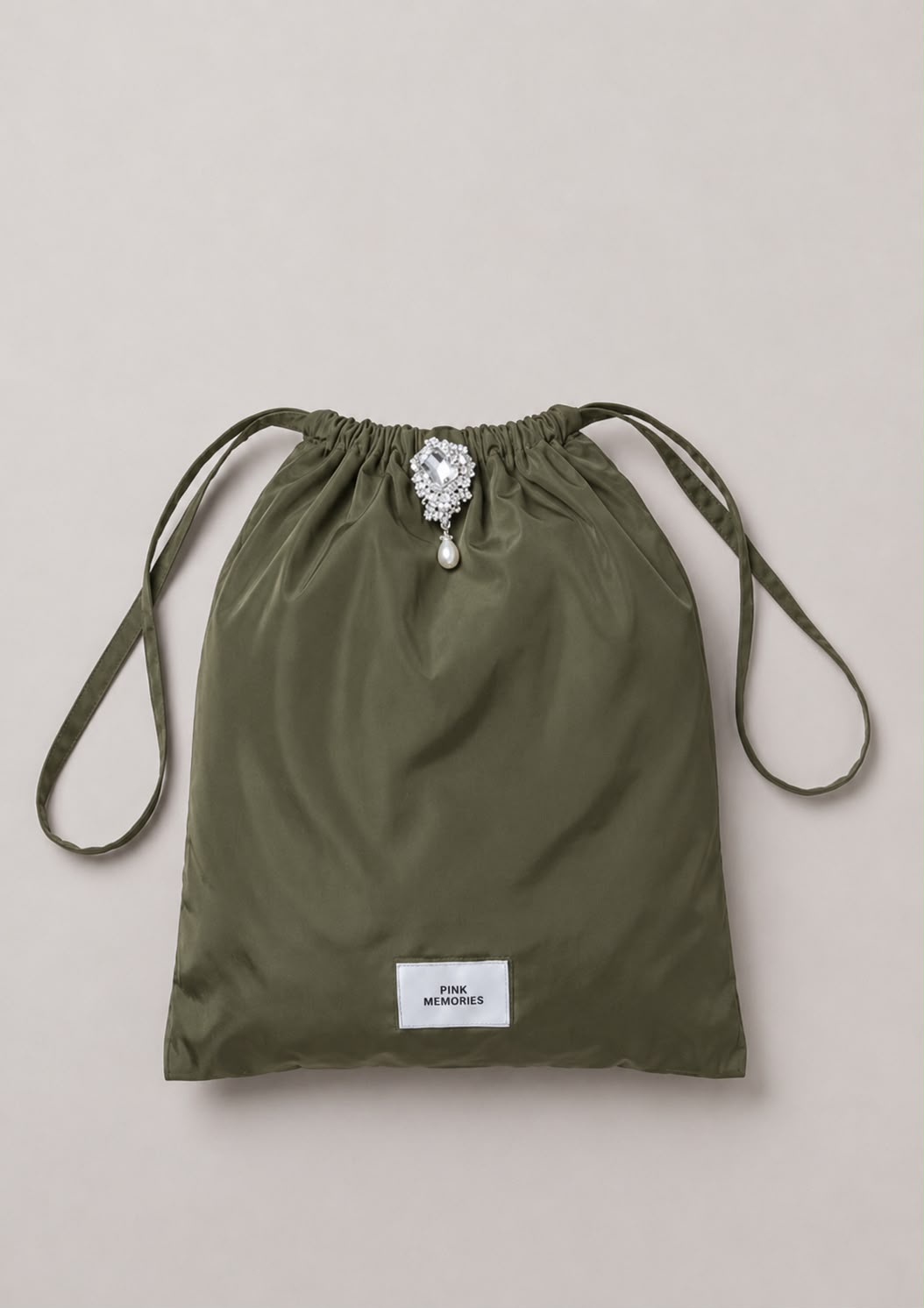 BAG WITH JEWEL BROOCH