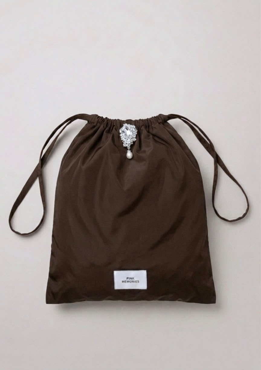BAG WITH JEWEL BROOCH