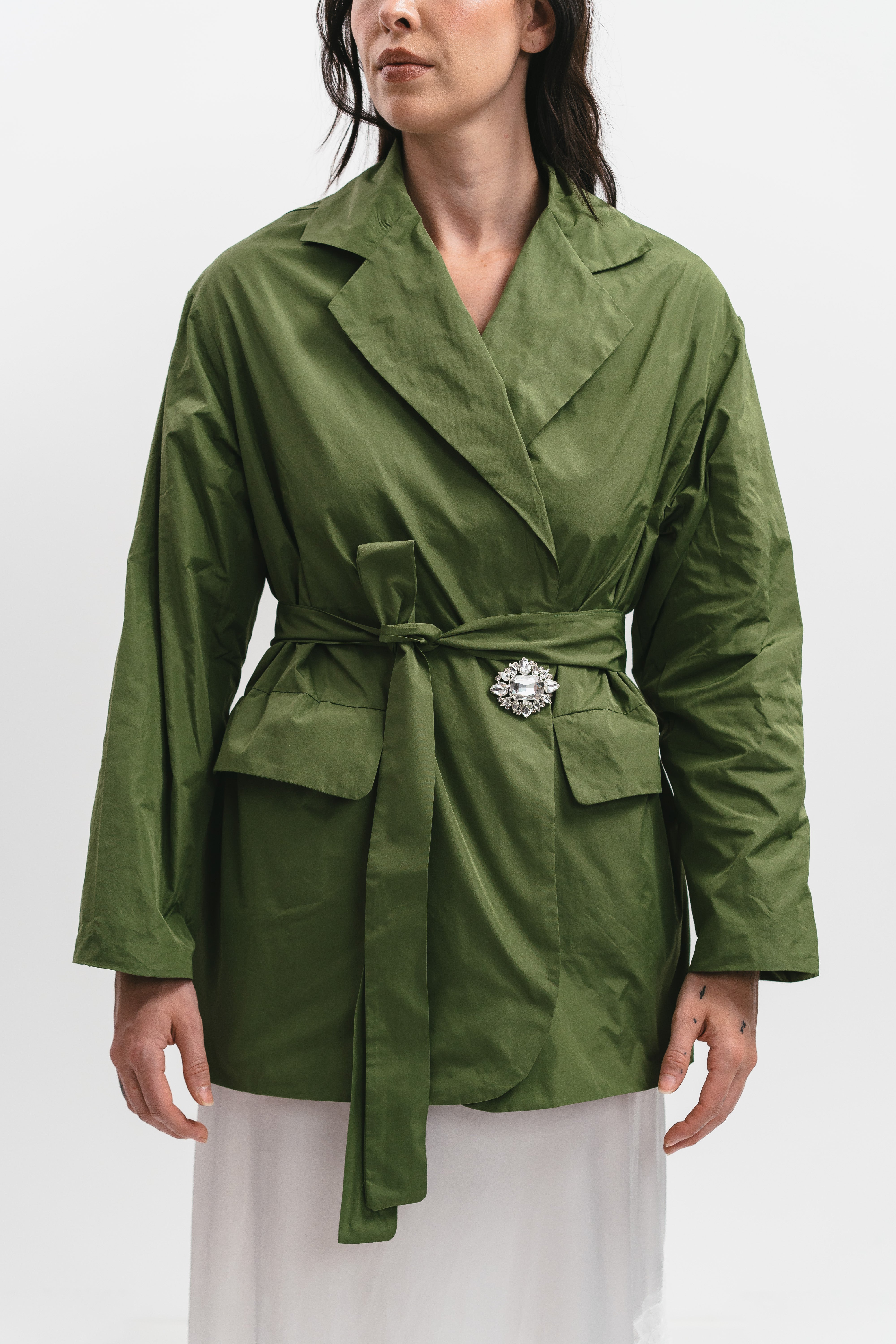WINDPROOF TAFFETA JACKET WITH BELT AND JEWEL BROOCH