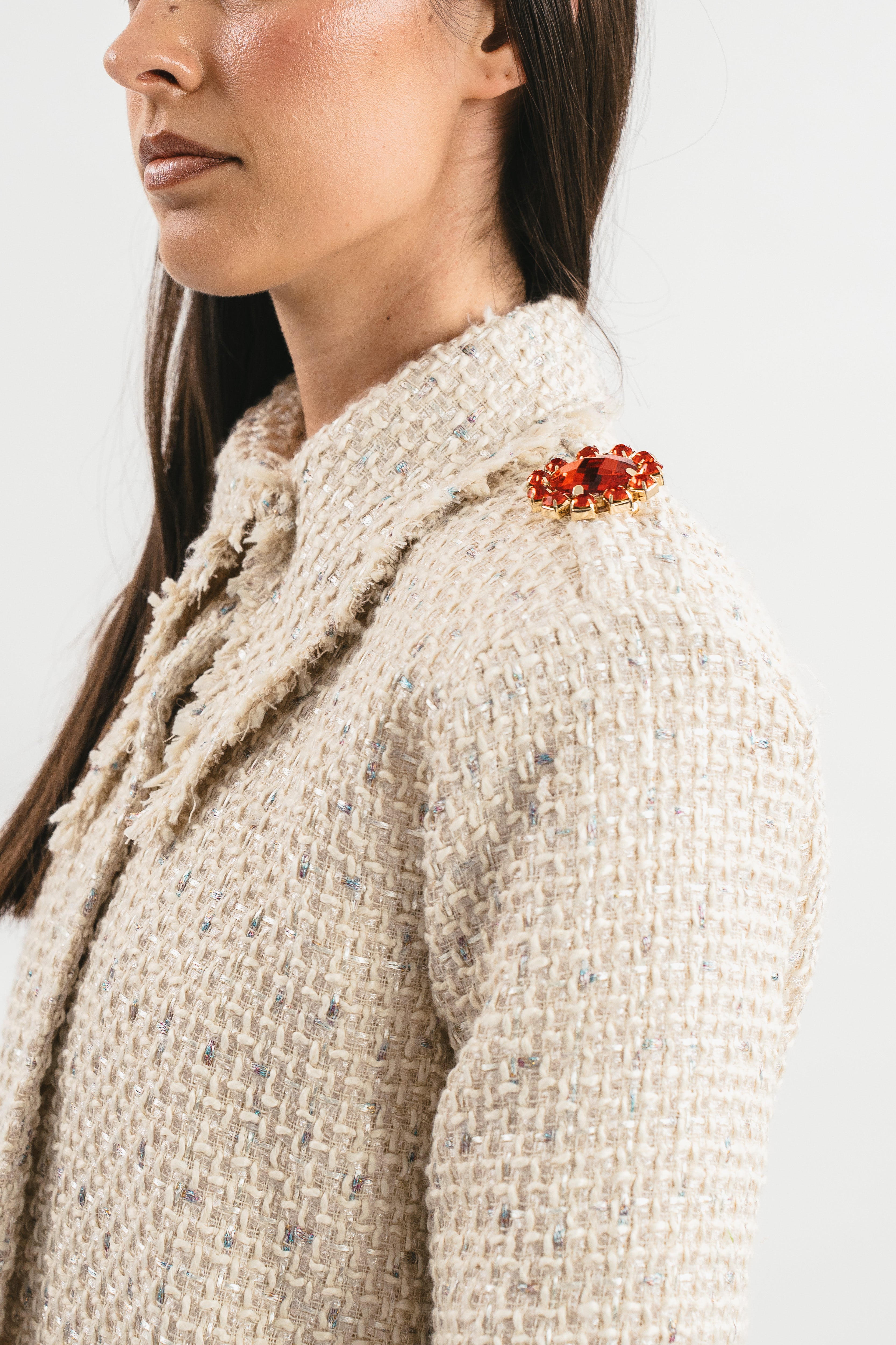 Jacket with jewel brooch